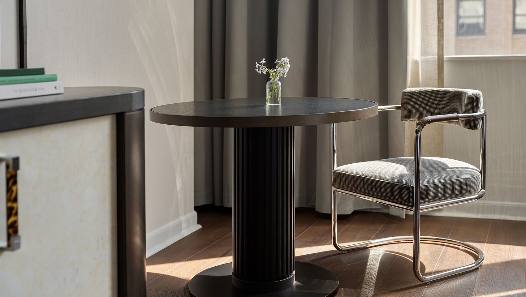 Table and chair in 1 King Guestroom at Kimpton Hotel Monaco Seattle